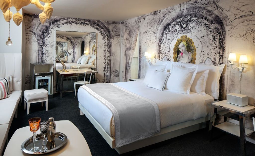 Picture of our Alexandria Iconic King room showing the full space and the bed
