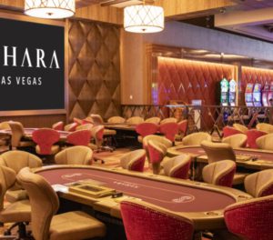 Photo of the poker room at SAHARA Las Vegas with poker tables and seating