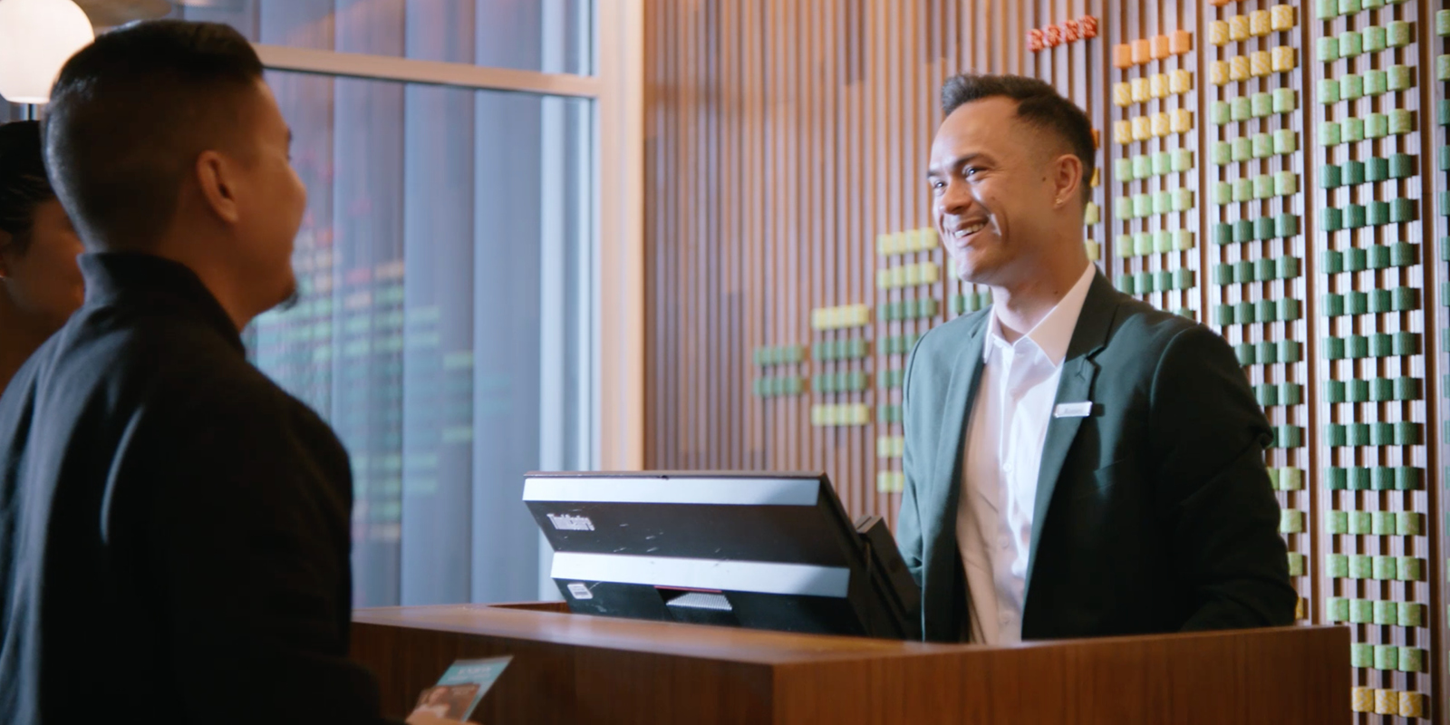 SAHARA Las Vegas front desk team member greeting guests