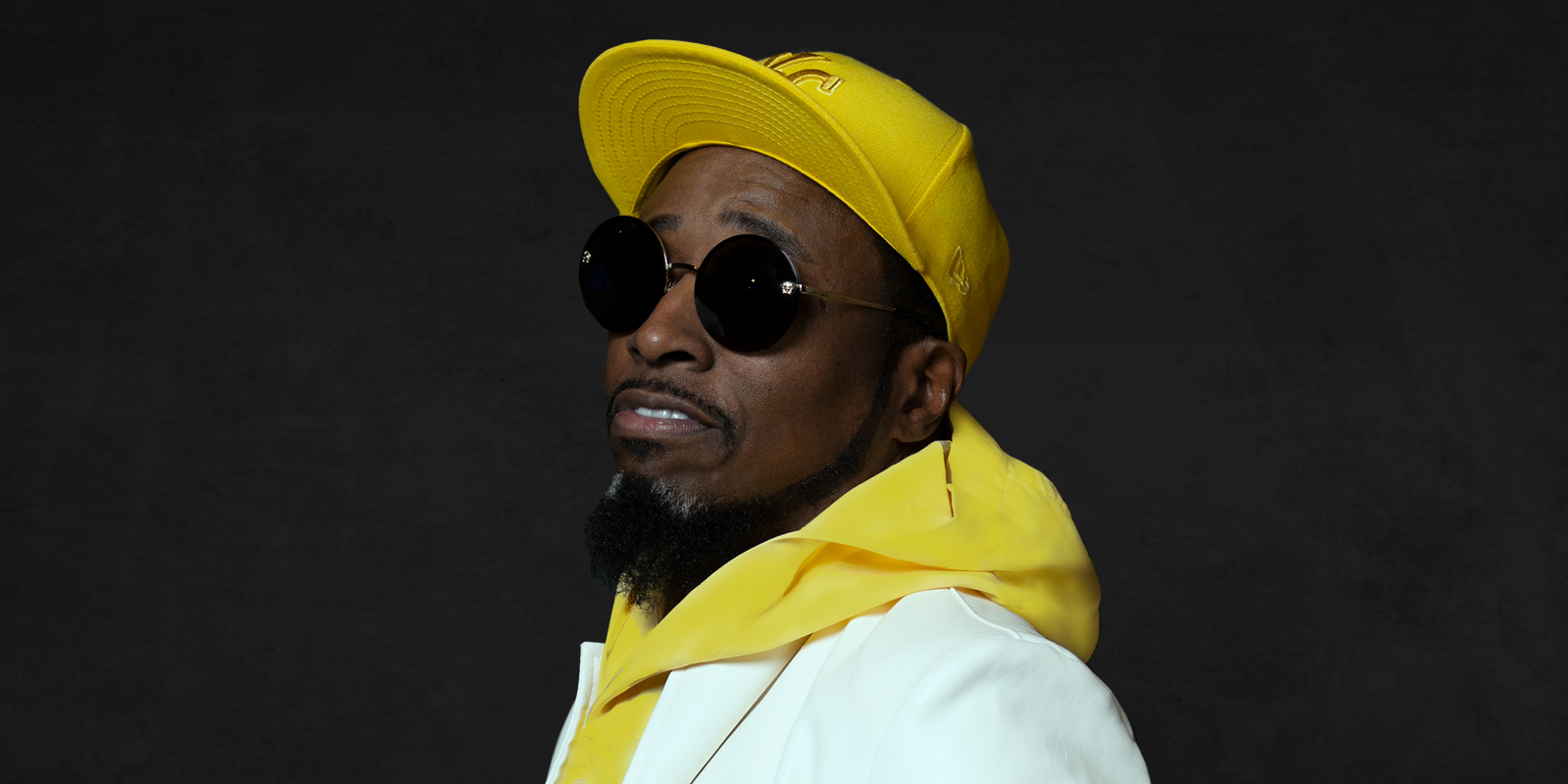 Image of Eddie Griffin with a yellow hat