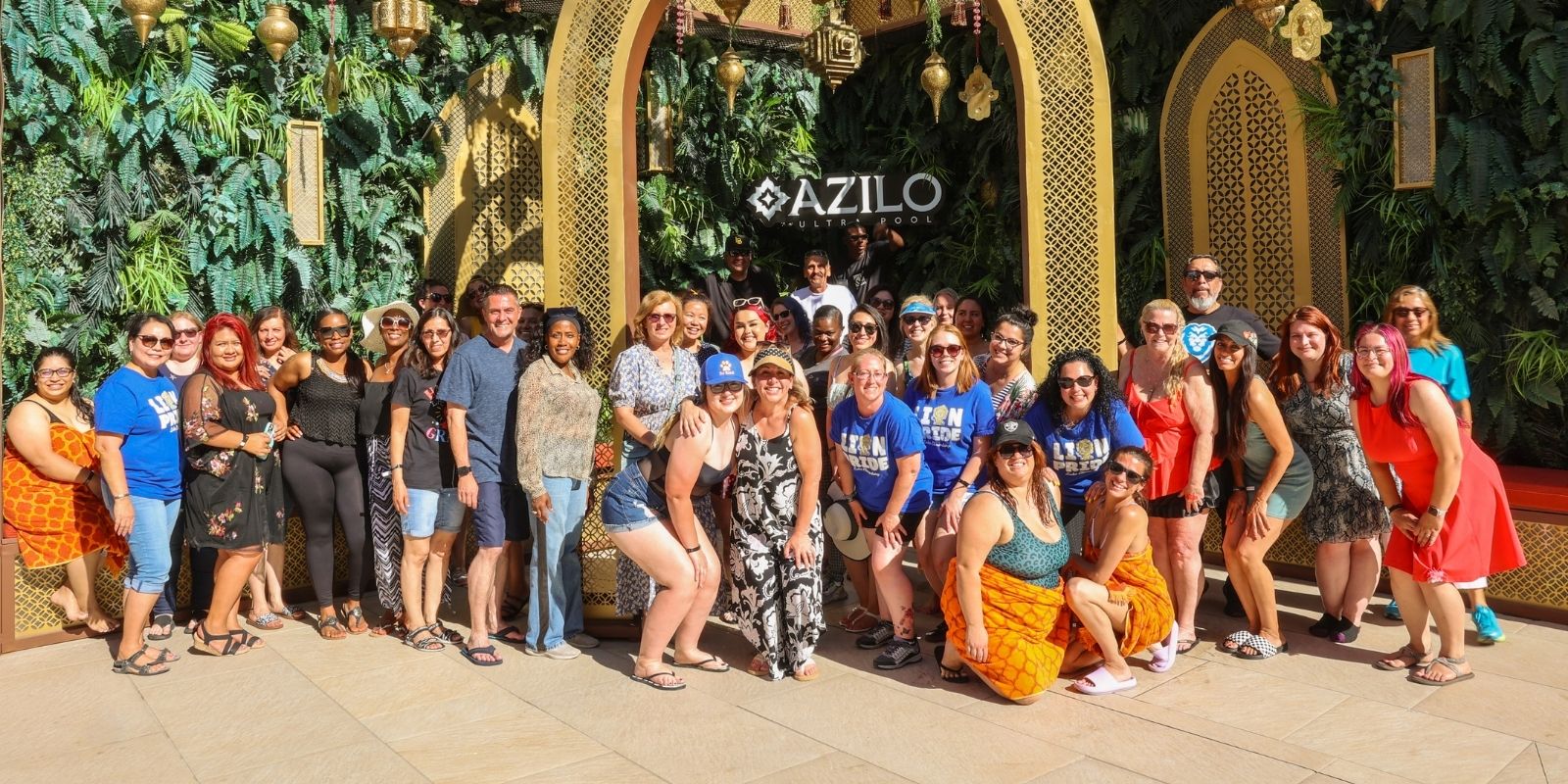 A picture showing all of the teachers from a local elementary school at the AZILO Ultra Pool lined up for a group picture.