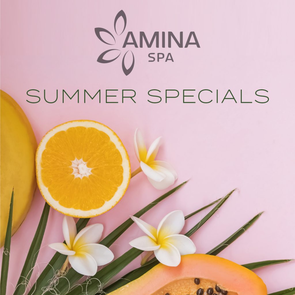 Amina Spa Summer Specials Visual showing a palm leaf, oranges, plumeria flowers and a mango over a pink background