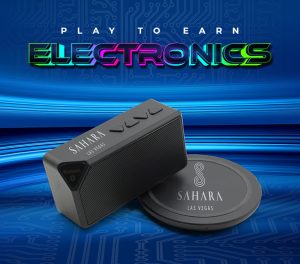 Play To Earn Electronics creative showing the title of the promotion as well as two electronic devices with a fun blue textural background