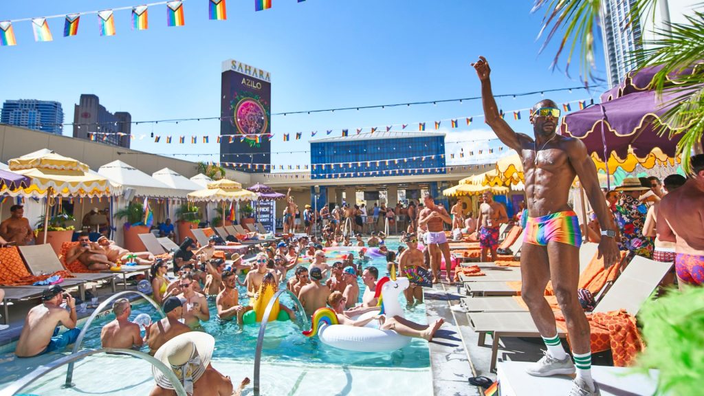 Elevate Pride Pool party showing people in the pool and dancing