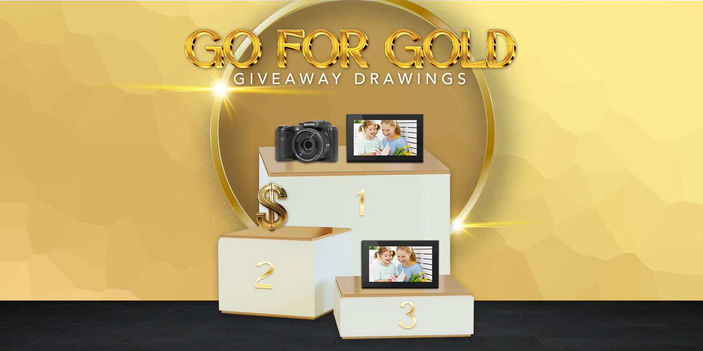 Tech sitting on white platforms with gold background with Go For Gold in gold lettering