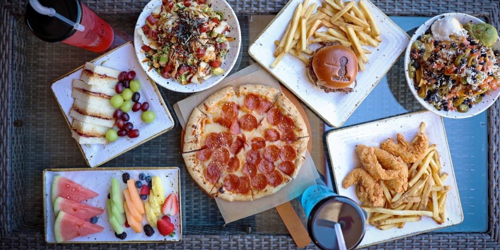 plates of food on a table at The Pool