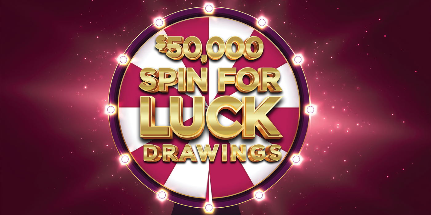 Red and white wheel with spin for luck in gold lettering